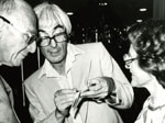 Jack Dunitz engaged in discussion with A. I. Kitaigorodskii and Olga Kennard, ca. 1970s.