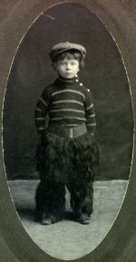 Linus Pauling, age 5, wearing cowboy chaps.