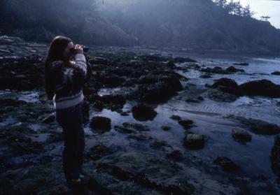 An unidentified student at the Oregon Coast. Image was in the Century Club presentation "Can't Do without OSU," 1983.