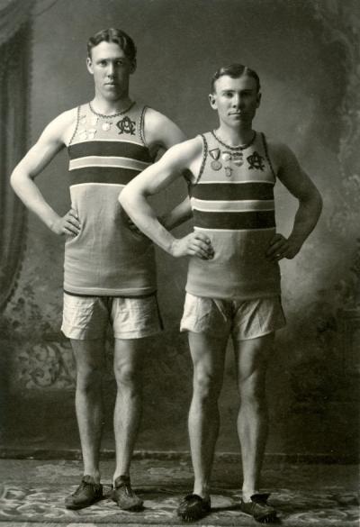 OAC track athletes. W. H. Davolt stands on the left.
