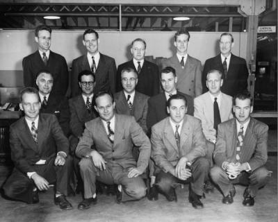 <p>Oregon Forest Products Laboratory staff, ca. 1949. Front Row, left to right: Hugh Wilcox, Murl Peterson, Bruce Anderson, James Holden. Center Row, left to right: Paul Dunn, Phimister Proctor, Ervin Kurth, Mortimer</p><p>				Macdonald, Leif Espenas. Back row, left to right: Bruce Wagg, Robert Stillinger, Maurice Gekeler, Robert Graham, William Baker.</p>