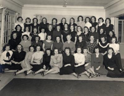 Jacquelin F. Holland, front row, fifth from left.