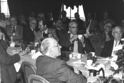 <p>Delmer Goode and Herman Scullen (far right) at the Triad Club head table, ca 1970s. Delmer Goode became Assistant College Editor in 1919, eventually serving as the Director of University Publications from 1943-1956. In</p><p>				1919, Goode founded Troop 1 of the Boy Scouts of America. Herman Scullen was a honey bee entomologist from 1920-1953. During Scullen's years in the Entomology department, the wasp collection increased dramatically. The</p><p>				Herman A. Scullen Memorial Fellowship was established for graduate studies in apiculture.</p>