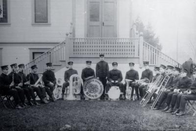 Corvallis High School Band in front of the Christian Church on 4th and Madison, Corvallis, Oregon, ca. 1900.