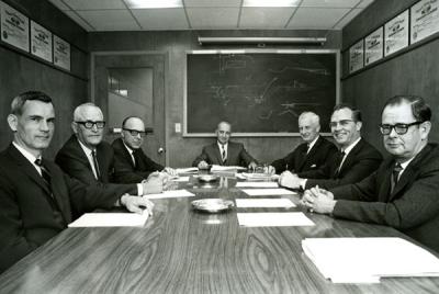 Members of the CH2M Board of Directors, ca. 1968. Pictured left to right are: Robert R. Adams, Ralph E. Roderick, Holly A. Cornell, James C. Howland, Thomas Burke Hayes, Fred E. Harem and Archie H. Rice.