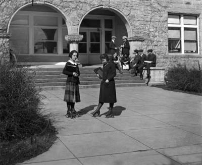College co-eds rollerskating, early 1920s. From left: Jean Bates and Jean Folsom.