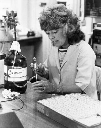 A researcher in the laboratory, ca. 1983. Research like that featured here begins not in the bottles of a lab shelf, but in the files of the Research Office, which coordinates and oversees all research projects at OSU's schools and colleges, as well as the numerous multi-disciplinary research centers and institutes managed by the University. In addition to reports summarizing grant projects, the records of the Research Office include minutes from committees involved in research and handbooks on research procedures and guidelines.