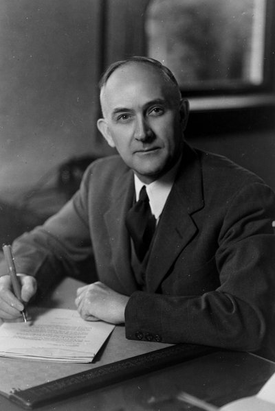 Black and white photograph of Francois Archibald Gilfillan at his desk.