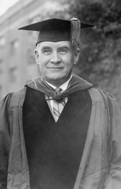 Black and white photograph of William Jasper Kerr in cap and gown.
