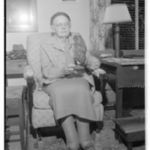 Grace McCormac French posing with a taxidermied owl