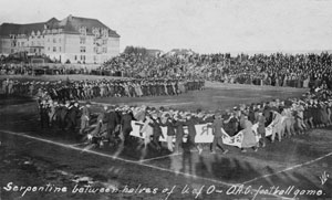 Fans serpentine at halftime of the Civil War football game, 1910.